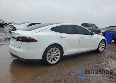2014 Tesla Model S z USA, uszkodzony, nr VIN 5YJSA1H15EFP56750